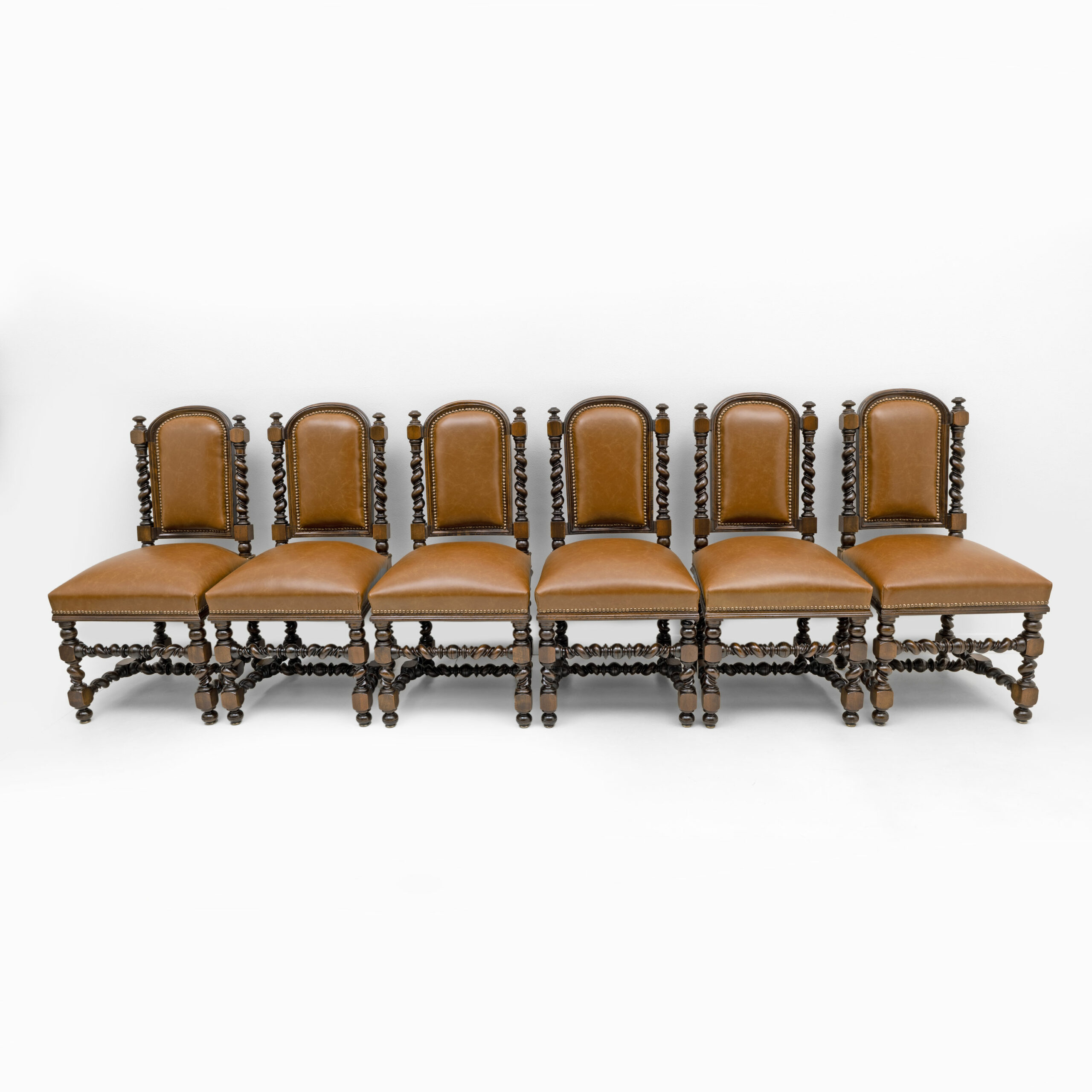 Six of Neo-Renaissance Walnut Dining Chairs in Genuine Leather.